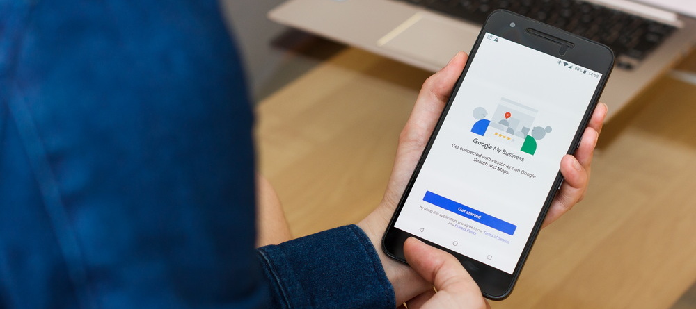 Person using Google My Business Mobile App for Messaging